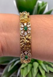 Graceful bangles with green stone and elephant design